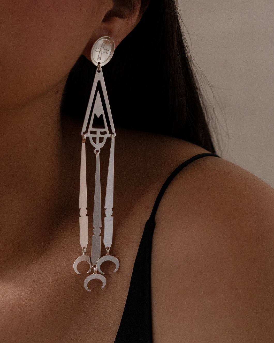 Sterling silver Southern Plains style earrings with buffalo crescent dangles